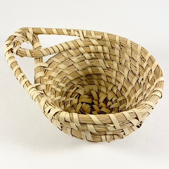 Vintage coiled basket with handle